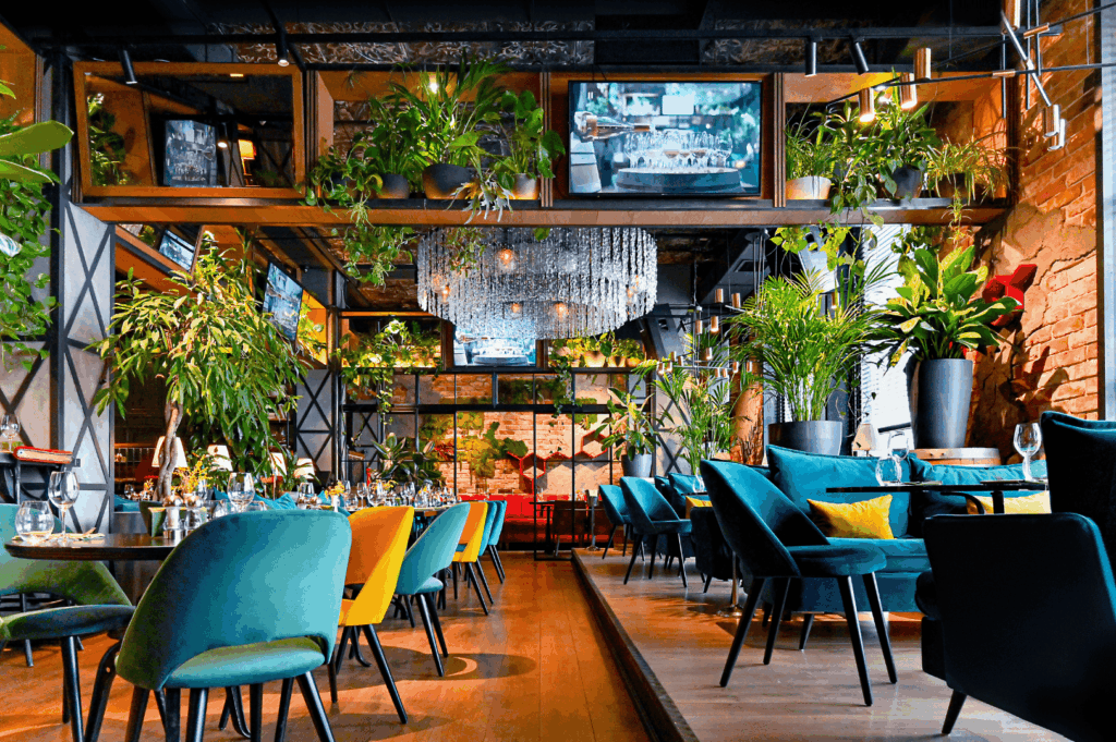 A modern restaurant interior design in Singapore created by expert renovation contractors in Singapore and best renovation contractors, blending lush greenery, vibrant furniture, and elegant lighting to inspire design ideas for restaurant design, commercial renovation, house renovation, and home renovation. Skilled renovation contractors and designers deliver services that connect homeowners and business owners, offering consultation on cost, materials, and layout for hotel, offices, retail, bar, residential, and HDB projects. This featured project showcases how contractors can transform a space with tailored interiors that reflect each client’s vision, suit their specialty, and evoke a unique mood and feeling. From kitchen upgrades to food venue makeovers, the team carries each moment to perfection, ensuring building quality, inspired details, and crucial design choices that homeowners and clients can expect. With strong reviews, this inspiration from York to Singapore proves why people search, refer, and trust these experts to deliver renovation results that are transformed, featured, and built to last.