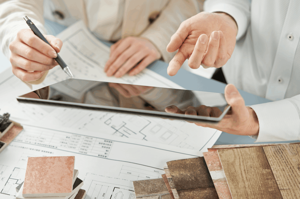 Two interior designers and renovation contractors in Singapore review blueprints, materials, and color swatches for a well planned restaurant renovation, discussing restaurant renovation cost, budget, and other factors such as lighting, plumbing, electrical, tiling, installation, and custom carpentry. This step by step guide approach by best renovation contractors ensures a successful restaurant renovation that meets changing consumer expectations, enhances customer experience, and delivers quality interiors for restaurant design, dining area layouts, bar counters, cafes, hotel, offices, and home renovation. The team of contractors and designer focus on space planning, layout, and furniture selection to create modern, tailored concepts that reflect the brand, suit the industry, and improve operations. From diners to bar spaces, landscape integration, and revamping house or restaurant space, their expertise and inspired design deliver transformed results with attention to detail, safety, and innovation. With inspiration from York to Singapore, these professionals connect homeowners and business owners, guiding them through the process of renovating with building excellence, strong reviews, and standout results in search for trusted renovation partners.