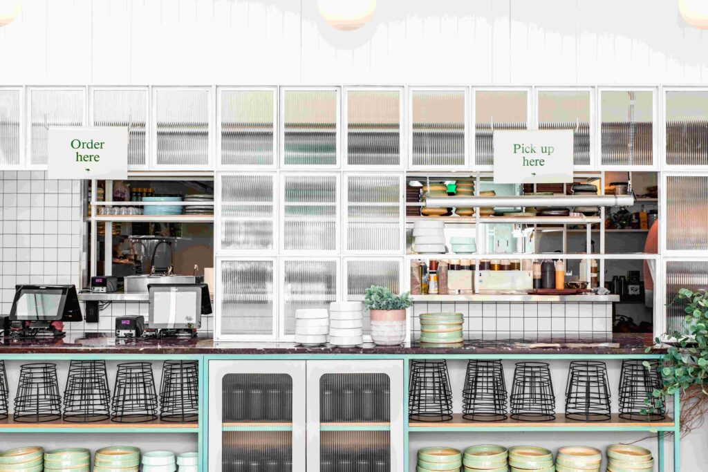 An image of a clean countertop and appliances that invites customers in to dine.