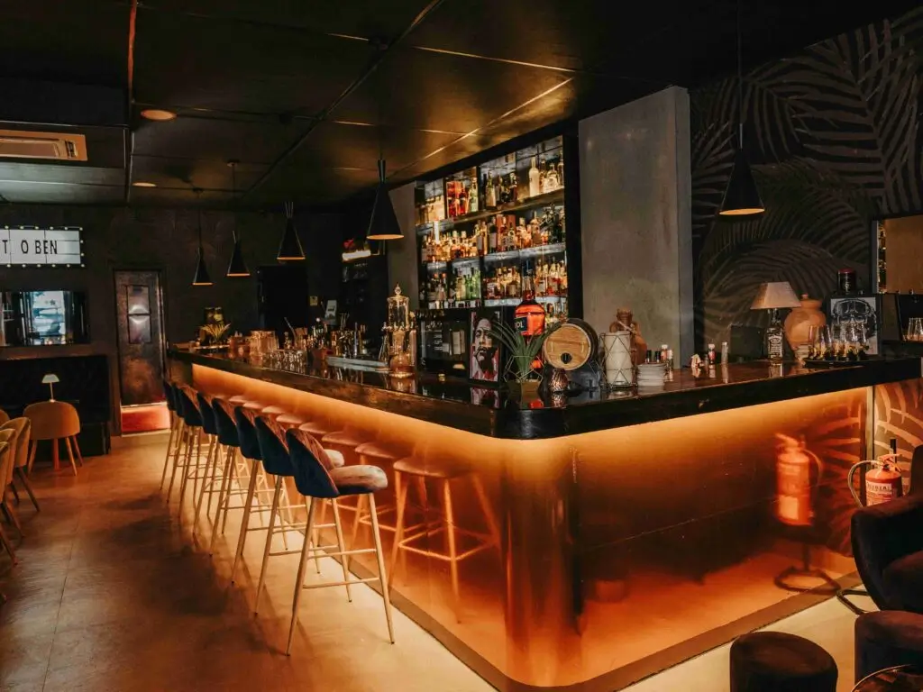 A beautifully lit bar area, highlighting the countertop's design.