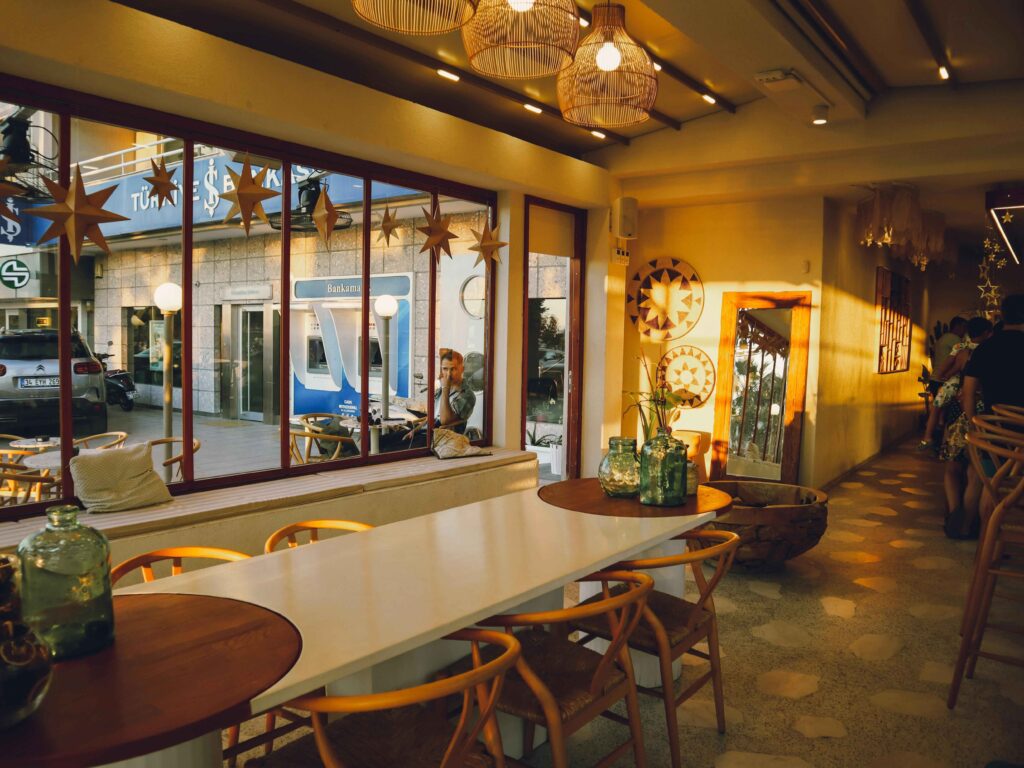A dining area lit by the warm gaze of the afternoon sun.