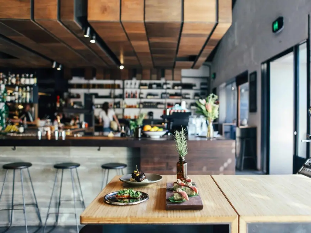 A stylish restaurant that uses natural elements as decor.