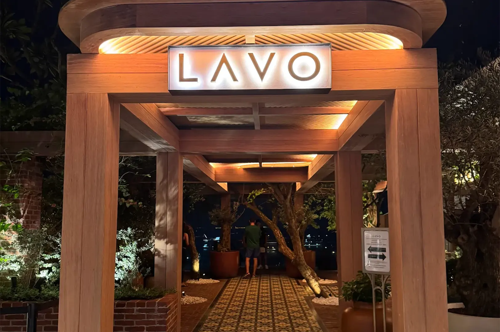 Illuminated entrance sign of LAVO Italian Restaurant at Marina Bay Sands Singapore at night